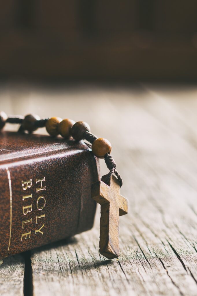 Rosary beads and holy bible.